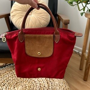 Red “Mini le pliage” Longchamp handbag